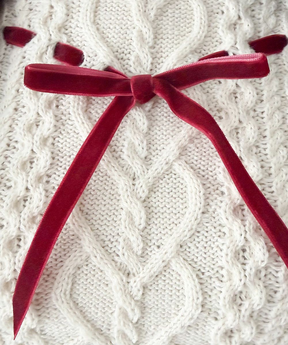 ハート型のはしごリボンがとびきりキュートなニットプルオーバー♡